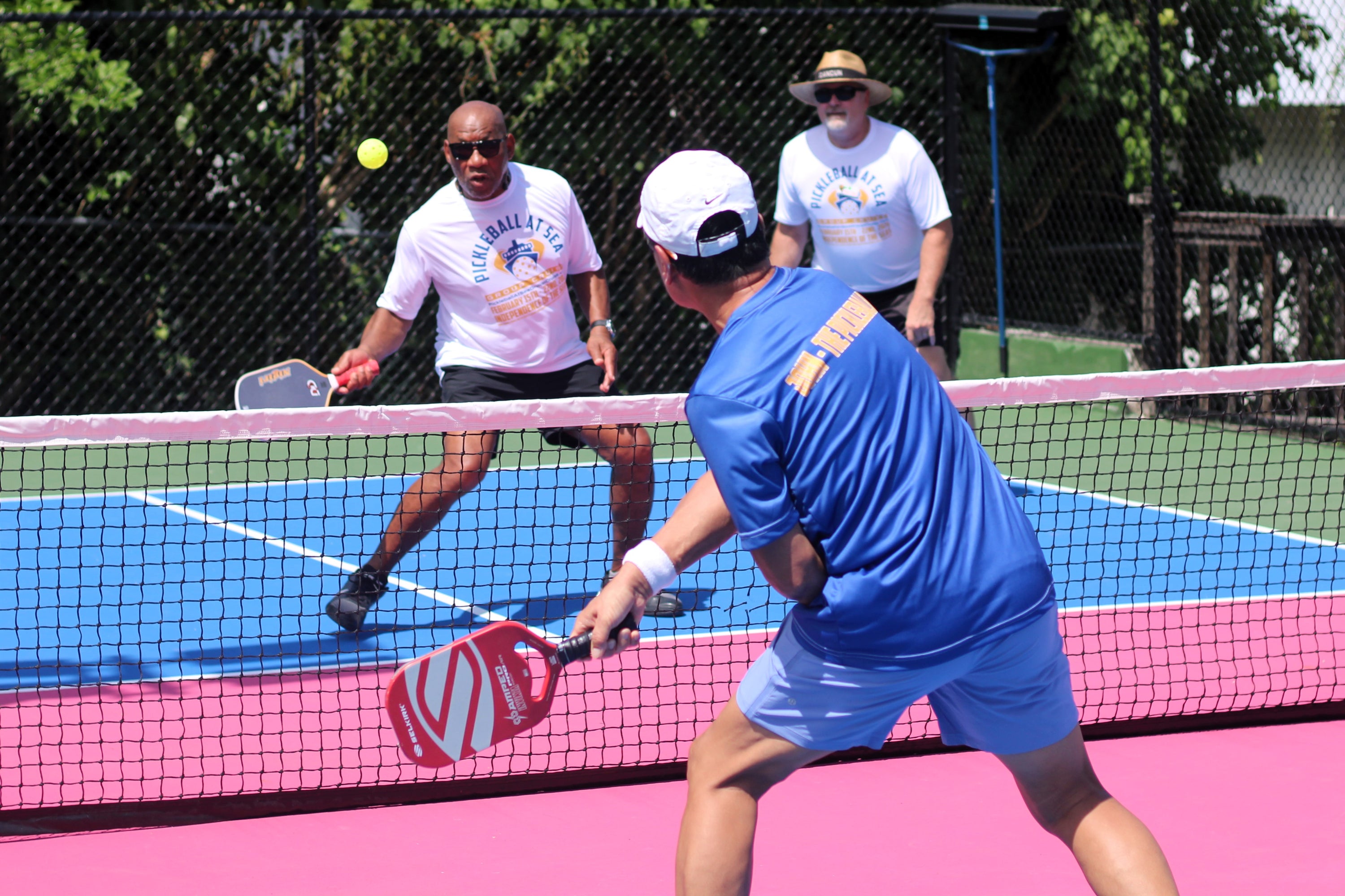 Guests playing Pickleball during a Pickleball At Sea Group Cruise vacation